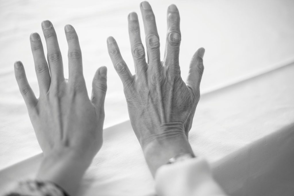 Two Hands. A Younger And Older One
