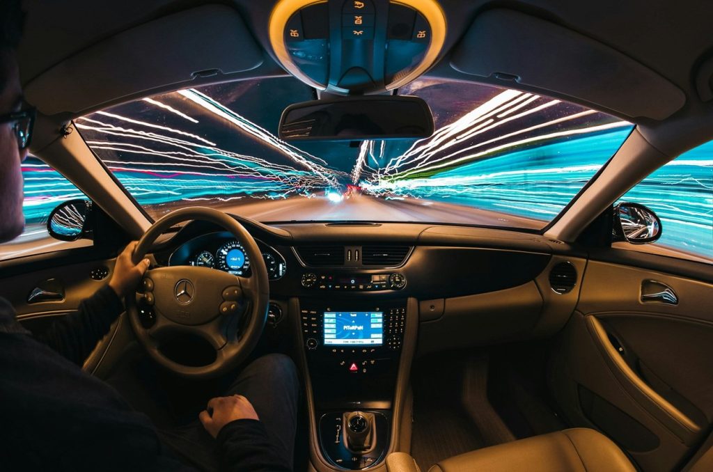 Man Driving A Car