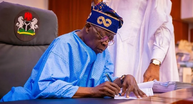 Tinubu Signing Tinubu Signing