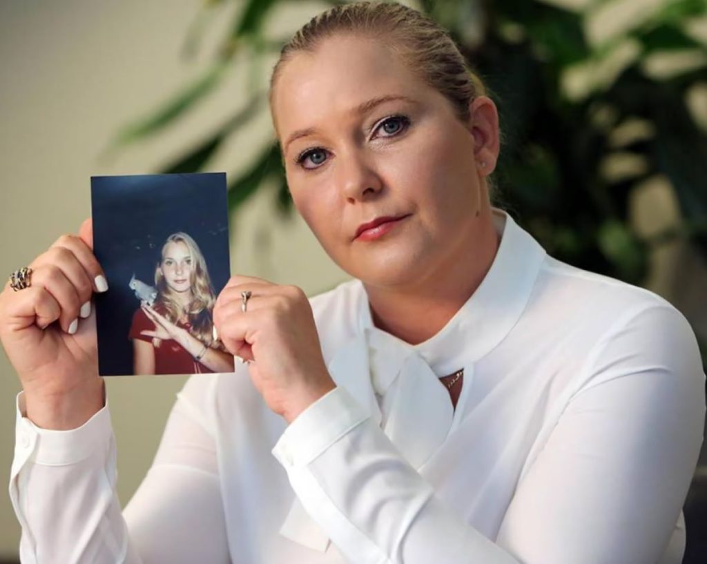 Virginia Giuffre With A Photo Of Herself As A Teenager
