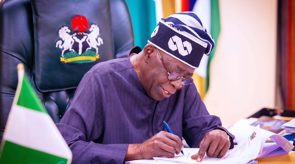 President Bola Ahmed Tinubu Signing Documents President Bola Ahmed Tinubu Signing Documents