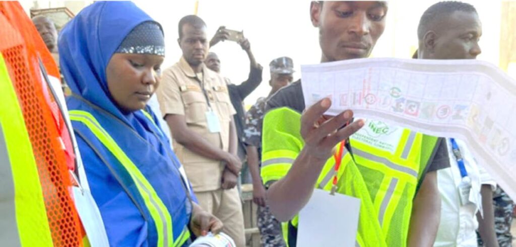 Ad hoc staff of the Independent National Electoral Commission INEC sorting election materials at the 2023 general elections Ad hoc staff of the Independent National Electoral Commission INEC sorting election materials at the 2023 general elections