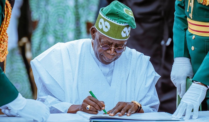 Tinubu Sign Tinubu Sign