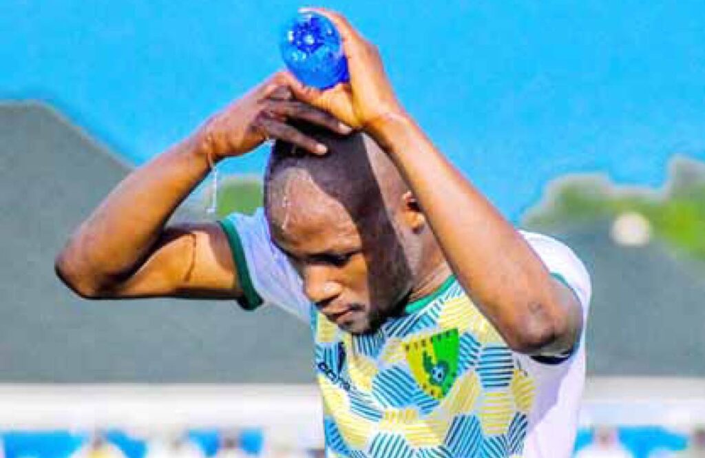 Player Of Plateau United Cooling Off During A Match In The Nigeria Premier League Player Of Plateau United Cooling Off During A Match In The Nigeria Premier League