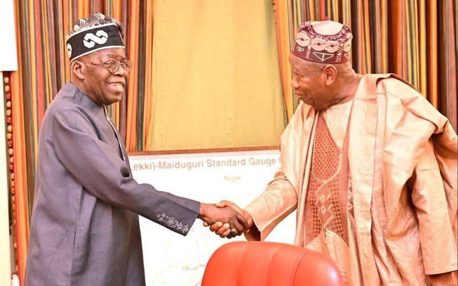 President Bola Tinubu In A Handshake With Abdullahi Ganduje President Bola Tinubu In A Handshake With Abdullahi Ganduje