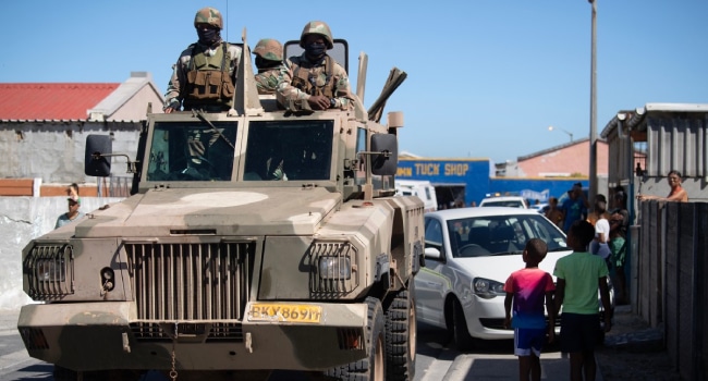 Soldiers Of The South African National Defence Force Sandf Ride In Their Mamba Armoured Vehicle Soldiers Of The South African National Defence Force Sandf Ride In Their Mamba Armoured Vehicle
