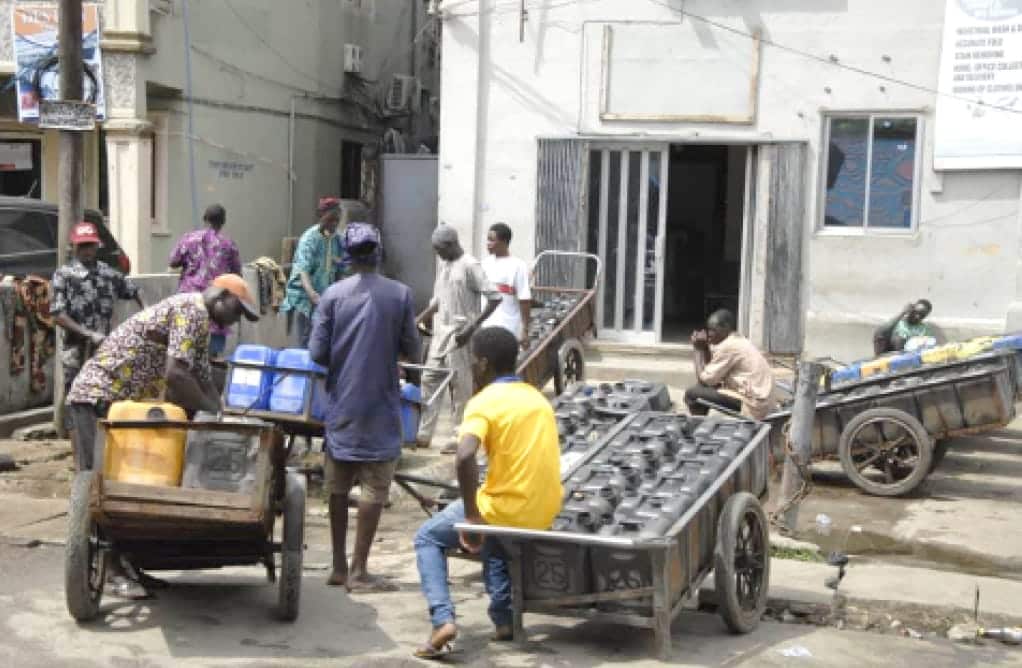 Vendors Fetching Water At Campbell Street Lagos Island. At The Weekend Vendors Fetching Water At Campbell Street Lagos Island. At The Weekend
